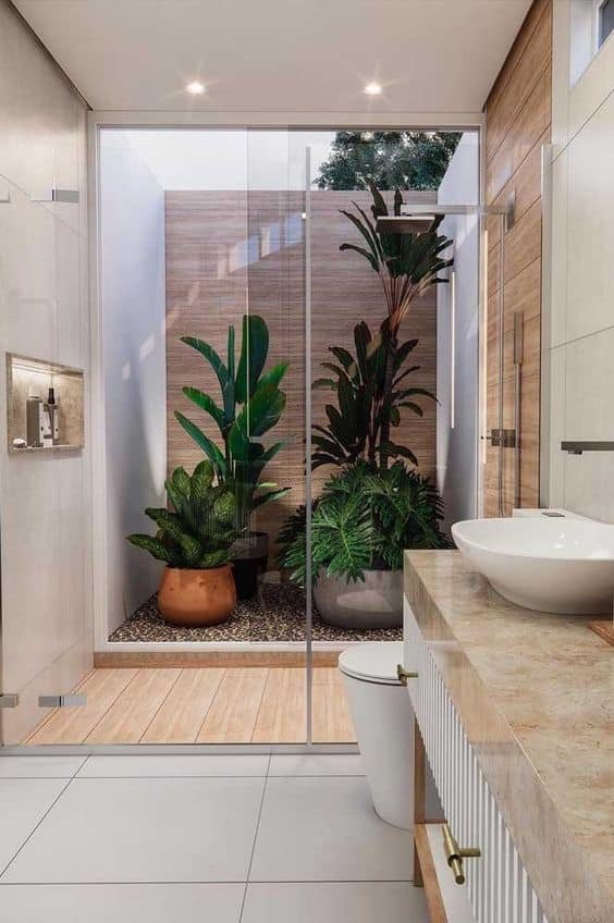 20 Ideias para um Banheiro com Jardim de Inverno 2 https://www.modulo21.com.br/wp-content/uploads/2024/07/1_banheiro-com-jardim-de-inverno.jpg